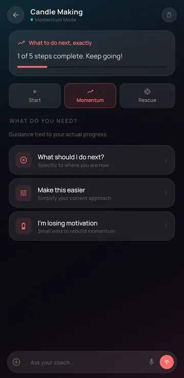 AI coach in momentum mode with quick actions like What should I do next and I’m losing motivation